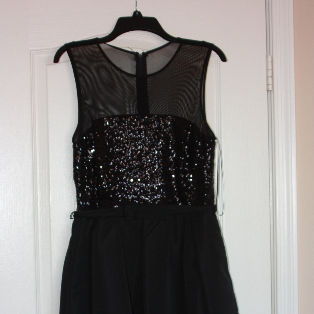 Beautiful holiday black dress with sequins and tulle